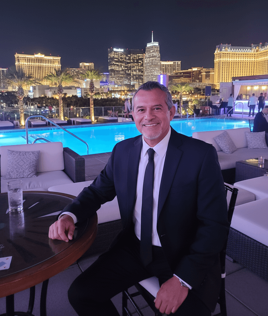 Warehouse Manager Rick Rodriguez sitting poolside at a rooftop poolclub in Vegas.